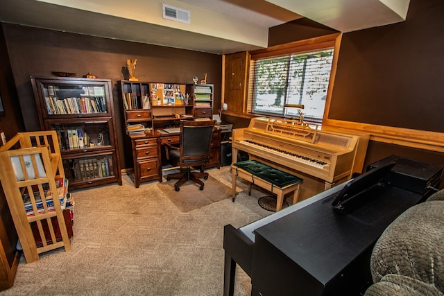 office space with light colored carpet