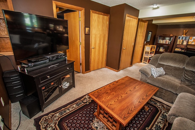 living area with light carpet