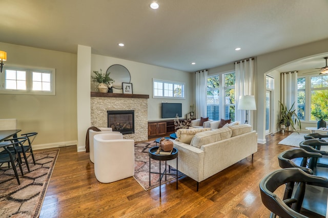 17796 Junelle Ct, Lakeville, MN 55044 - living room featuring a fireplace, healthy amount of natural light, wood finished floors, and recessed lighting