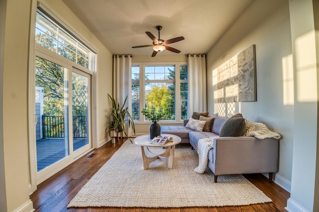 17796 Junelle Ct, Lakeville, MN 55044 - living area with ceiling fan, dark wood-style flooring, and baseboards