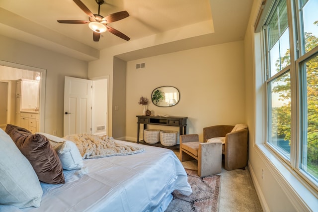 17796 Junelle Ct, Lakeville, MN 55044 - bedroom featuring carpet flooring, baseboards, ensuite bath, and a ceiling fan