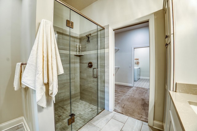 17796 Junelle Ct, Lakeville, MN 55044 - full bath with a shower stall, tile patterned floors, and baseboards