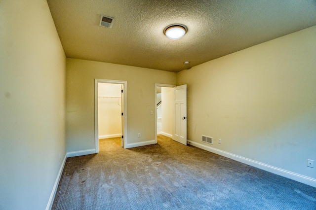 17796 Junelle Ct, Lakeville, MN 55044 - carpeted spare room with baseboards and a textured ceiling