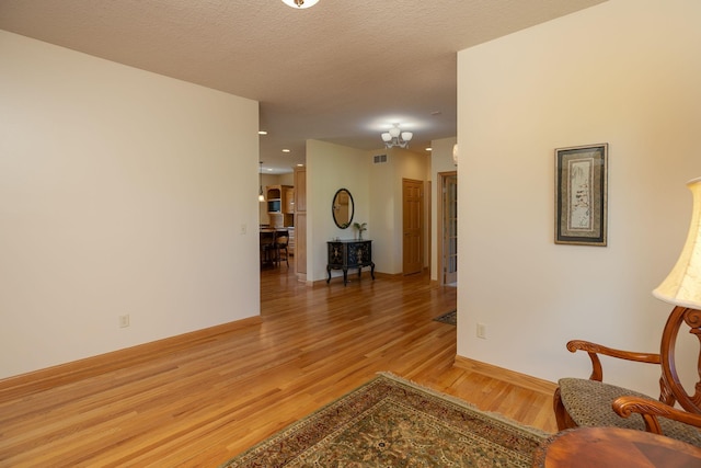770 Valley View Rd SW, Oronoco, MN 55960 - sitting room featuring light wood-style flooring and baseboards