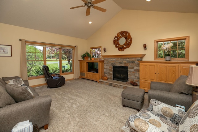 770 Valley View Rd SW, Oronoco, MN 55960 - carpeted living room featuring a ceiling fan, high vaulted ceiling, a stone fireplace, recessed lighting, and baseboards
