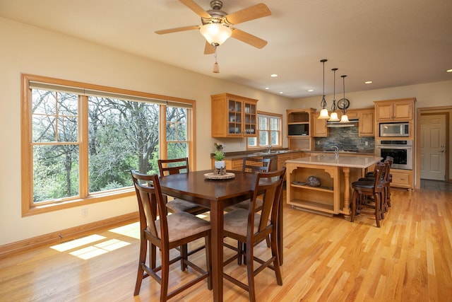 770 Valley View Rd SW, Oronoco, MN 55960 - dining space with light wood-type flooring, recessed lighting, baseboards, and ceiling fan