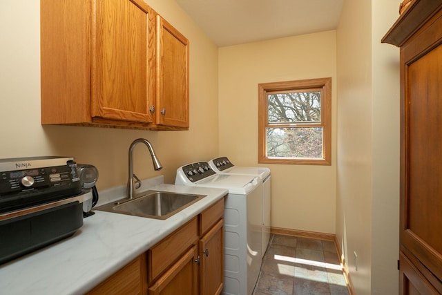 770 Valley View Rd SW, Oronoco, MN 55960 - laundry area with separate washer and dryer, cabinet space, and baseboards