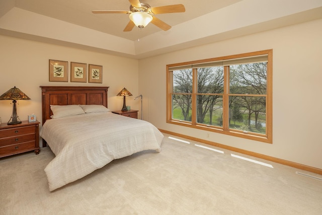 770 Valley View Rd SW, Oronoco, MN 55960 - bedroom with light colored carpet, baseboards, and ceiling fan