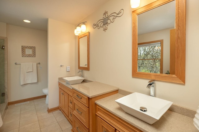 770 Valley View Rd SW, Oronoco, MN 55960 - full bath with toilet, a tile shower, tile patterned floors, vanity, and recessed lighting