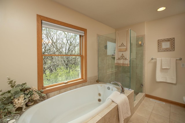 770 Valley View Rd SW, Oronoco, MN 55960 - bathroom featuring a stall shower, tile patterned flooring, a whirlpool tub, baseboards, and recessed lighting