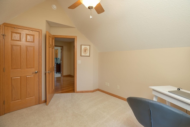 770 Valley View Rd SW, Oronoco, MN 55960 - office featuring vaulted ceiling, carpet floors, baseboards, a ceiling fan, and a textured ceiling