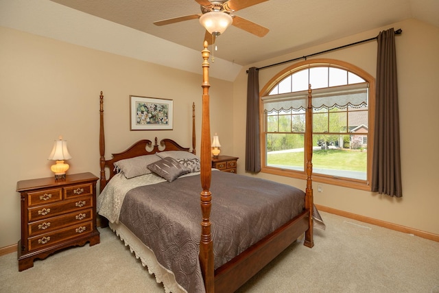 770 Valley View Rd SW, Oronoco, MN 55960 - bedroom featuring lofted ceiling, carpet flooring, baseboards, and a ceiling fan