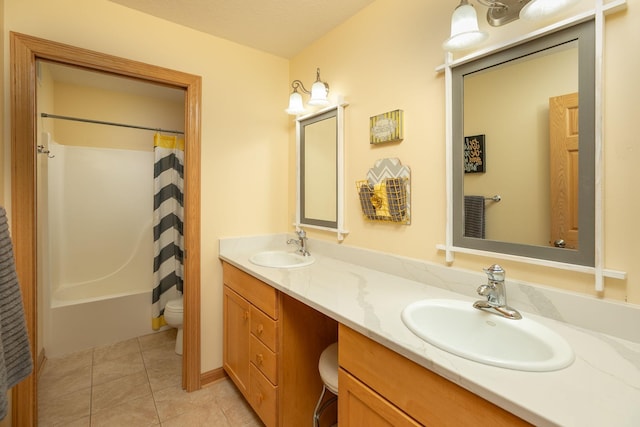 770 Valley View Rd SW, Oronoco, MN 55960 - bathroom with toilet, tile patterned flooring, double vanity, and shower / bath combo