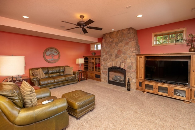 770 Valley View Rd SW, Oronoco, MN 55960 - carpeted living area with a ceiling fan, healthy amount of natural light, a fireplace, and recessed lighting