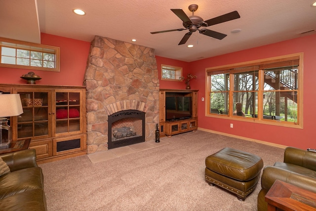 770 Valley View Rd SW, Oronoco, MN 55960 - living room with carpet flooring, a fireplace, recessed lighting, ceiling fan, and baseboards