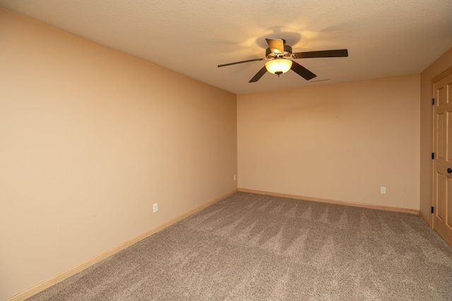 770 Valley View Rd SW, Oronoco, MN 55960 - empty room featuring light carpet, ceiling fan, baseboards, and a textured ceiling