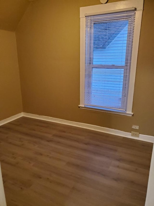 4422 Bryant Ave N, Minneapolis, MN 55412 - bonus room featuring wood finished floors and baseboards