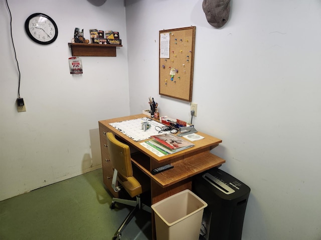 office space with concrete flooring