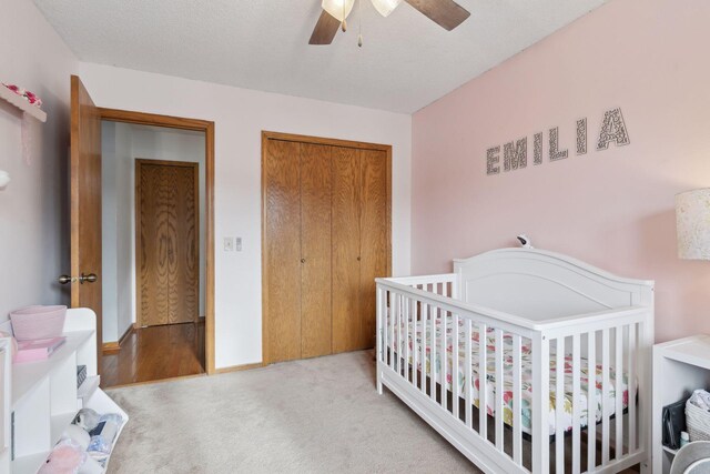 14870 Endicott Way Unit 20, Apple Valley, MN 55124 - bedroom with carpet, a closet, ceiling fan, and a nursery area