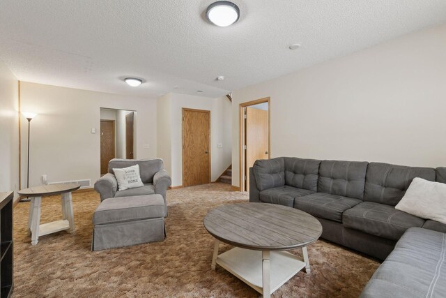 14870 Endicott Way Unit 20, Apple Valley, MN 55124 - living room with a textured ceiling, carpet flooring, and stairs