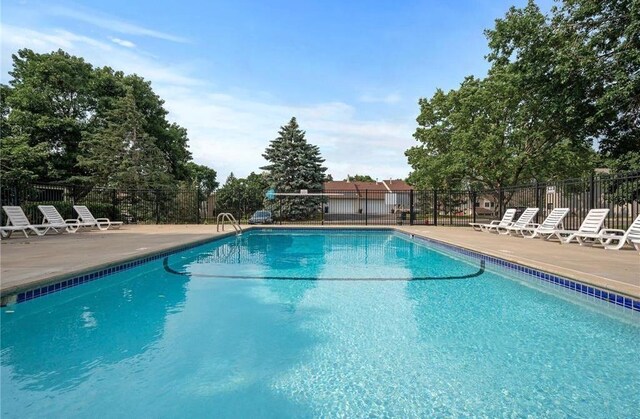 14870 Endicott Way Unit 20, Apple Valley, MN 55124 - community pool featuring a patio and fence