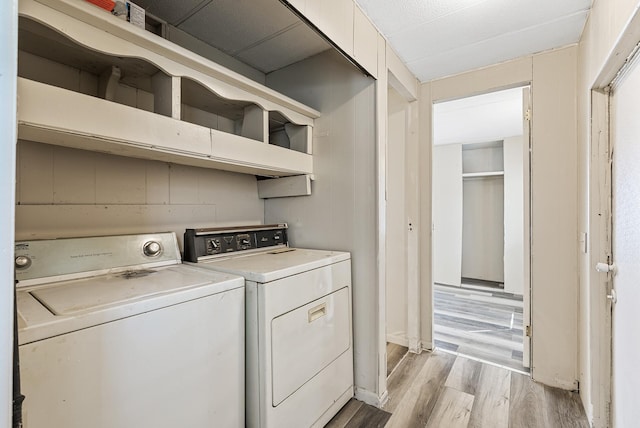501 Forest St Unit 18, Belle Plaine, MN 56011 - laundry area featuring washing machine and dryer and light wood finished floors