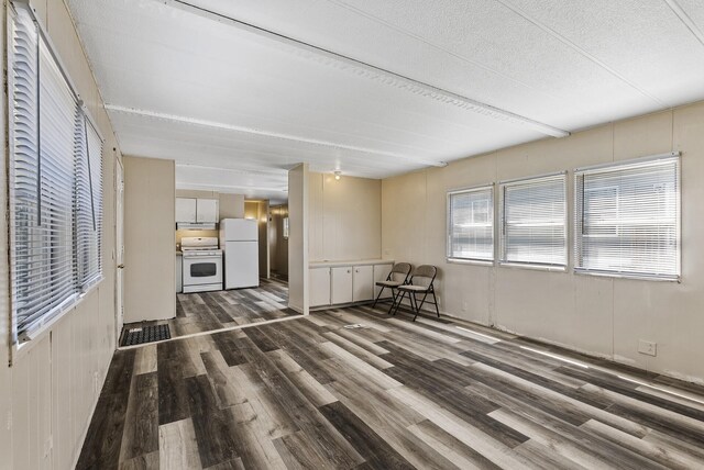 501 Forest St Unit 18, Belle Plaine, MN 56011 - living room with dark wood-style floors and a textured ceiling