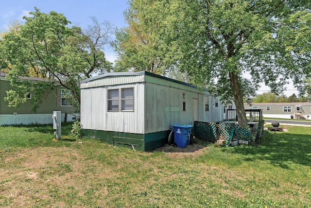 501 Forest St Unit 18, Belle Plaine, MN 56011 - view of property exterior with a yard