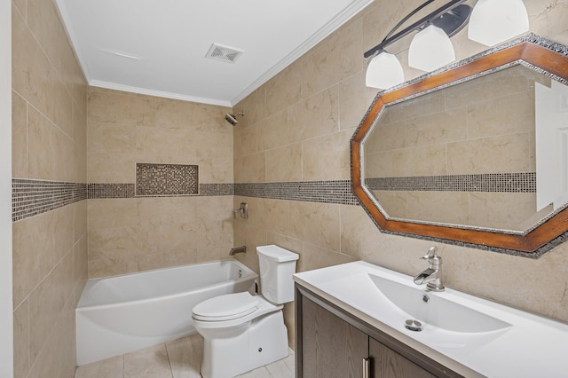 bathroom with tile walls, crown molding, bathtub / shower combination, toilet, and vanity