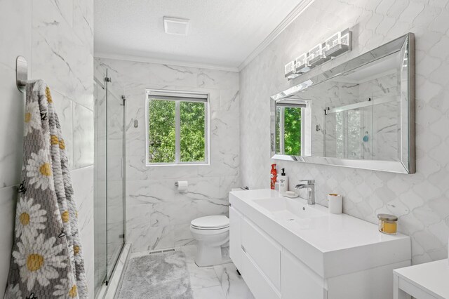 full bathroom featuring marble look tiles, ornamental molding, a marble finish shower, vanity, and toilet