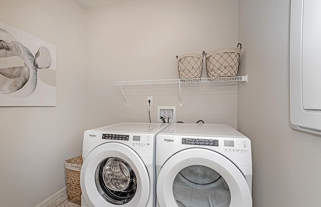 9997 Mulberry Ln, Corcoran, MN 55374 - laundry room with independent washer and dryer and baseboards