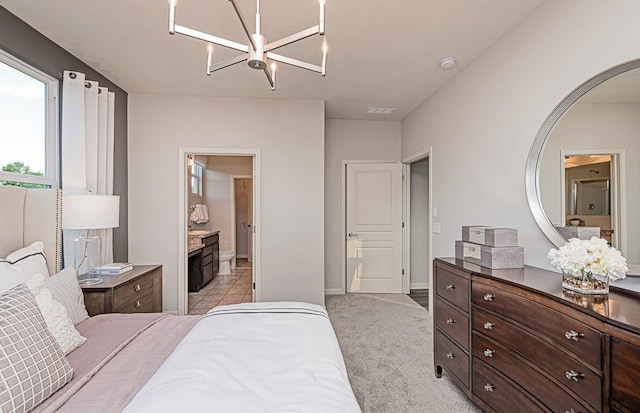 9997 Mulberry Ln, Corcoran, MN 55374 - bedroom with a chandelier, light colored carpet, connected bathroom, and baseboards