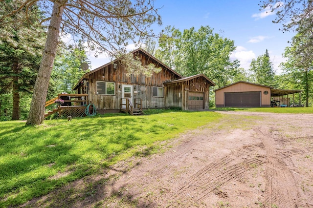 rustic home featuring dirt driveway, a garage, a front yard, and a chimney
