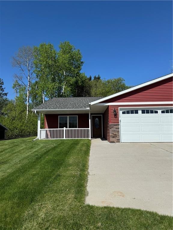 169 Amber View St, Menomonie, WI 54751 - view of front facade with a front lawn, covered porch, an attached garage, and driveway