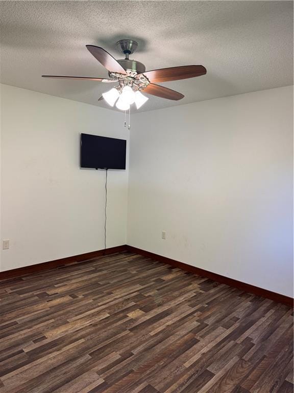 169 Amber View St, Menomonie, WI 54751 - unfurnished room with dark wood-style flooring, ceiling fan, a textured ceiling, and baseboards