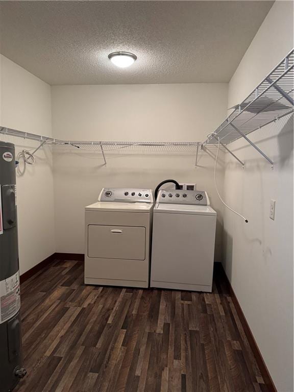 169 Amber View St, Menomonie, WI 54751 - laundry room featuring independent washer and dryer, dark wood-style flooring, water heater, baseboards, and a textured ceiling