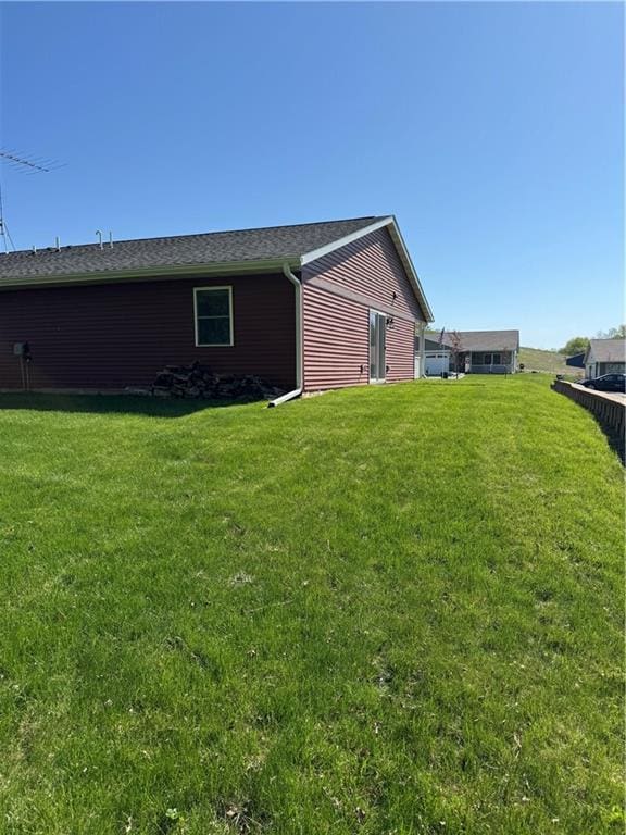 169 Amber View St, Menomonie, WI 54751 - view of home's exterior featuring a lawn