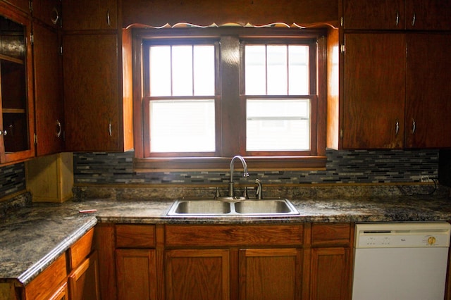2612 3rd Ave W, Hibbing, MN 55746 - kitchen featuring dishwasher, backsplash, and dark countertops