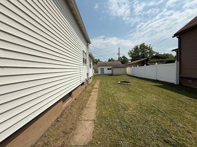 2612 3rd Ave W, Hibbing, MN 55746 - view of yard featuring an outdoor fire pit