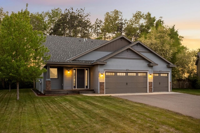 7730 Trappers Ridge Dr, Clear Lake, MN 55319 - craftsman-style house with driveway, an attached garage, a lawn, and roof with shingles