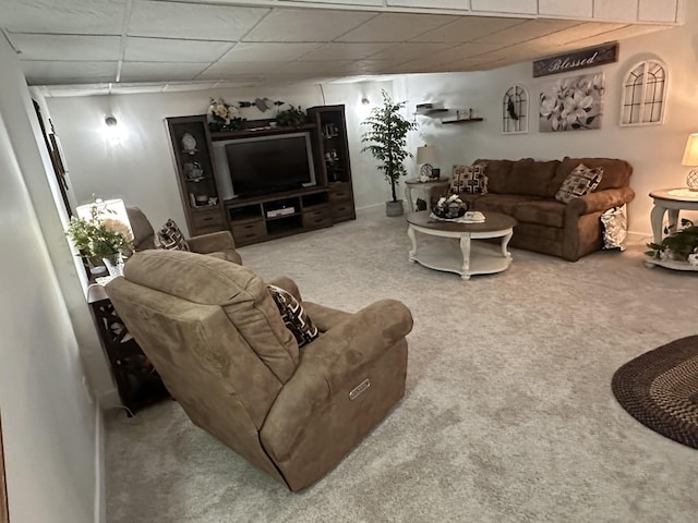 carpeted living room with baseboards