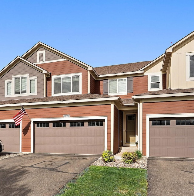 3165 Countryside Ave Unit B, Woodbury, MN 55129 - multi unit property with an attached garage and asphalt driveway