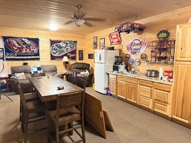 303 4th St S, Hoffman, MN 56339 - dining room featuring carpet flooring, ceiling fan, wood walls, and wood ceiling