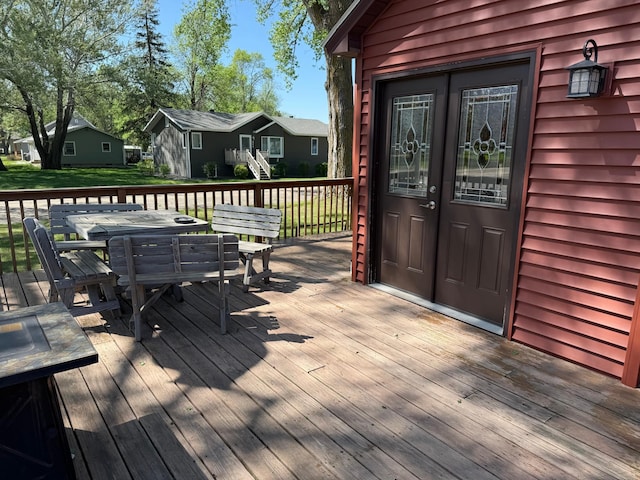 303 4th St S, Hoffman, MN 56339 - deck featuring outdoor dining space and a residential view