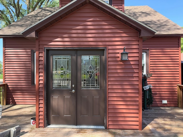 303 4th St S, Hoffman, MN 56339 - property entrance with a chimney and roof with shingles