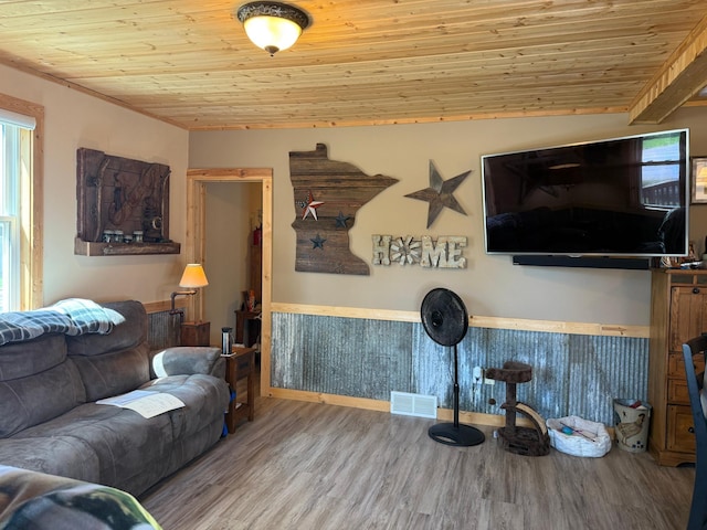 303 4th St S, Hoffman, MN 56339 - living room featuring wooden ceiling, wood finished floors, and baseboards