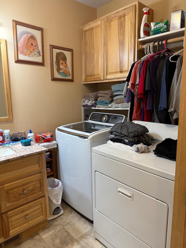 303 4th St S, Hoffman, MN 56339 - clothes washing area featuring cabinet space and separate washer and dryer