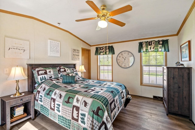 10412 Lakeside Dr, Pine Lake Twp, MN 55735 - bedroom with vaulted ceiling, crown molding, multiple windows, wood finished floors, and ceiling fan