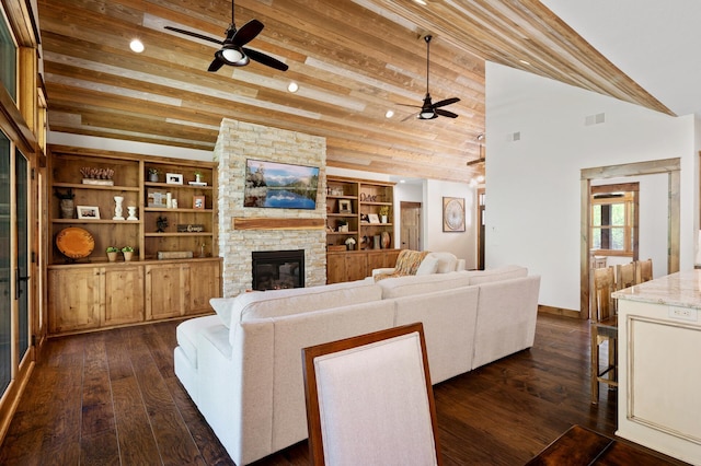 living room with ceiling fan, a fireplace, dark wood-style flooring, high vaulted ceiling, and wooden ceiling