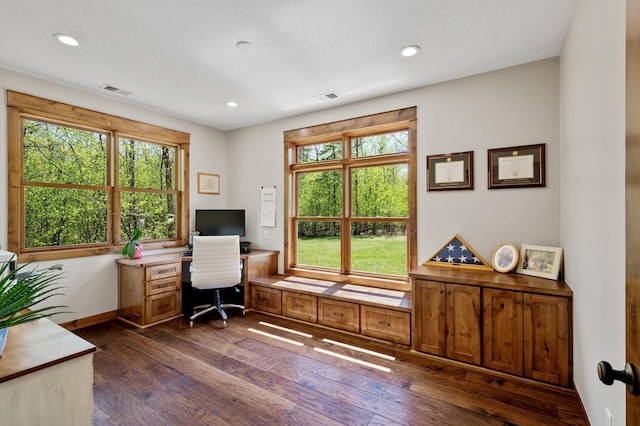 office space featuring dark wood-style flooring, recessed lighting, and baseboards